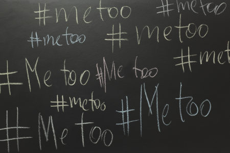 me too written with chalk on blackboard.