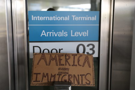 Protest Sign Outside the Arrivals Terminal at San Francisco International Airport